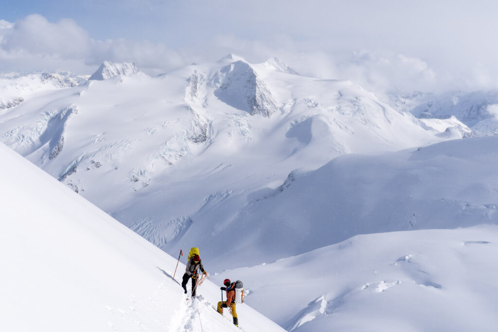 Instructor explaining avalanche terrain recognition to students